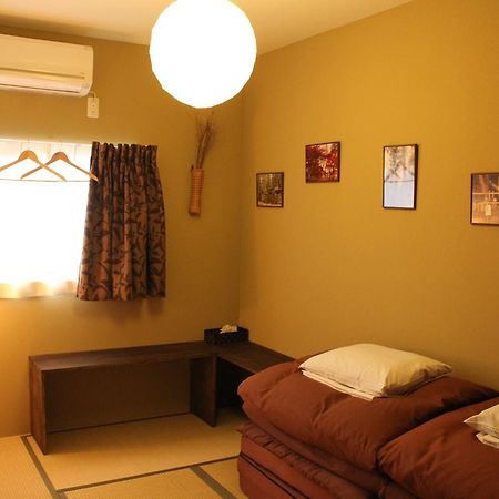 Bar And Hostel Mondo Ōsaka Extérieur photo