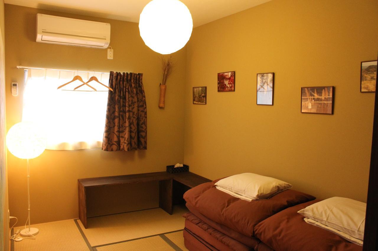 Bar And Hostel Mondo Ōsaka Extérieur photo